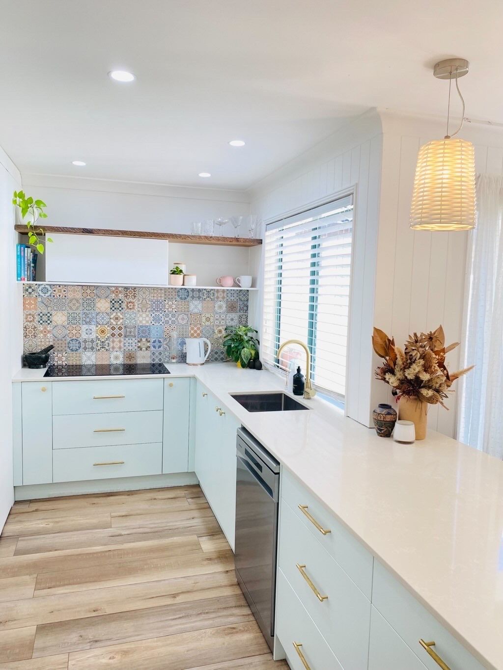 Bright Modern Kitchen with White Cabinets and Patterned Backsplash — JPR Concepts in Burleigh Heads, QLD