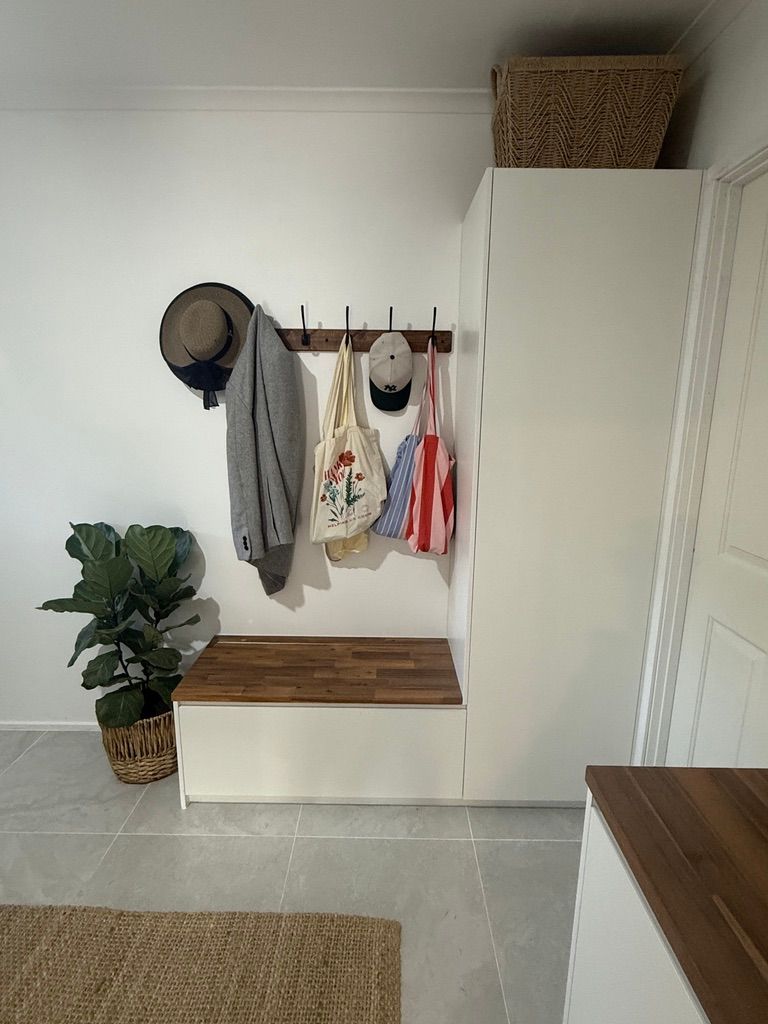 Entryway with A Wall Mounted Coat Rack, Hanging Hats and Scarves — JPR Concepts in Burleigh Heads, QLD