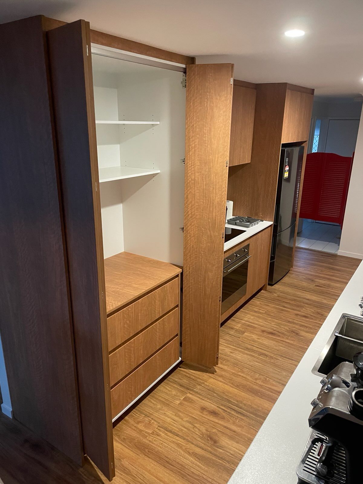 Modern Kitchen with Wood Cabinets — JPR Concepts in Burleigh Heads, QLD