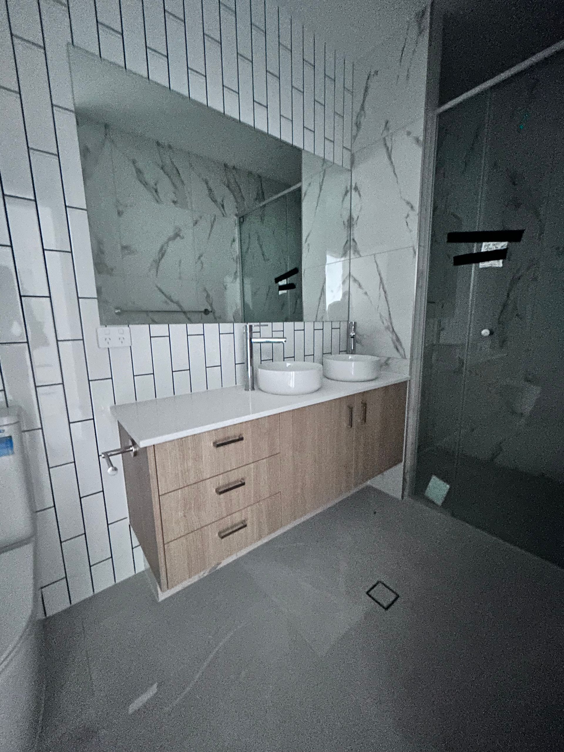 Modern Bathroom Vanity with Wood Drawers, and Gray Tiled Walls and Floor — JPR Concepts in Burleigh Heads, QLD