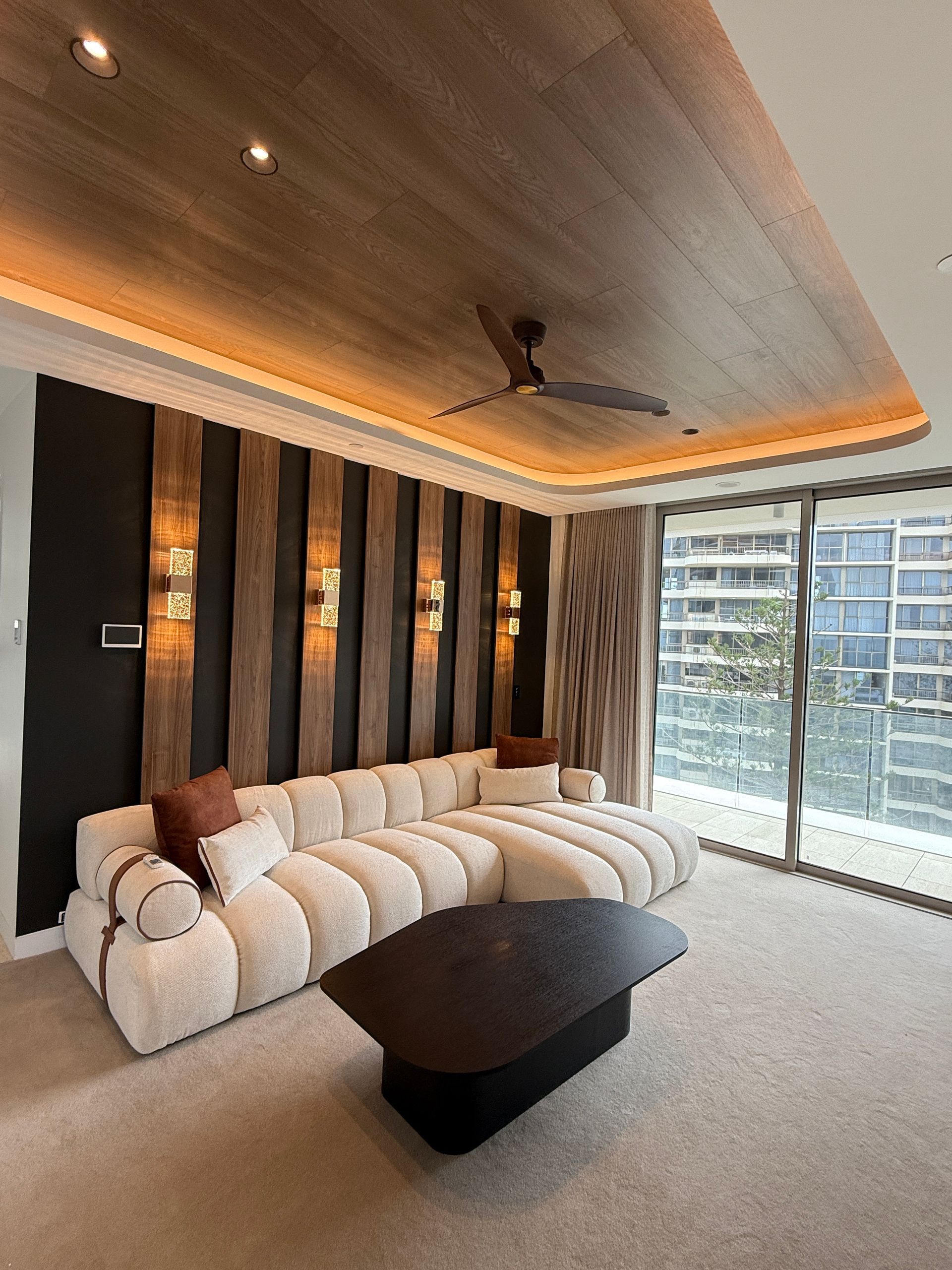 Modern Luxury Living Room with Curved White Sofa — JPR Concepts in Burleigh Heads, QLD