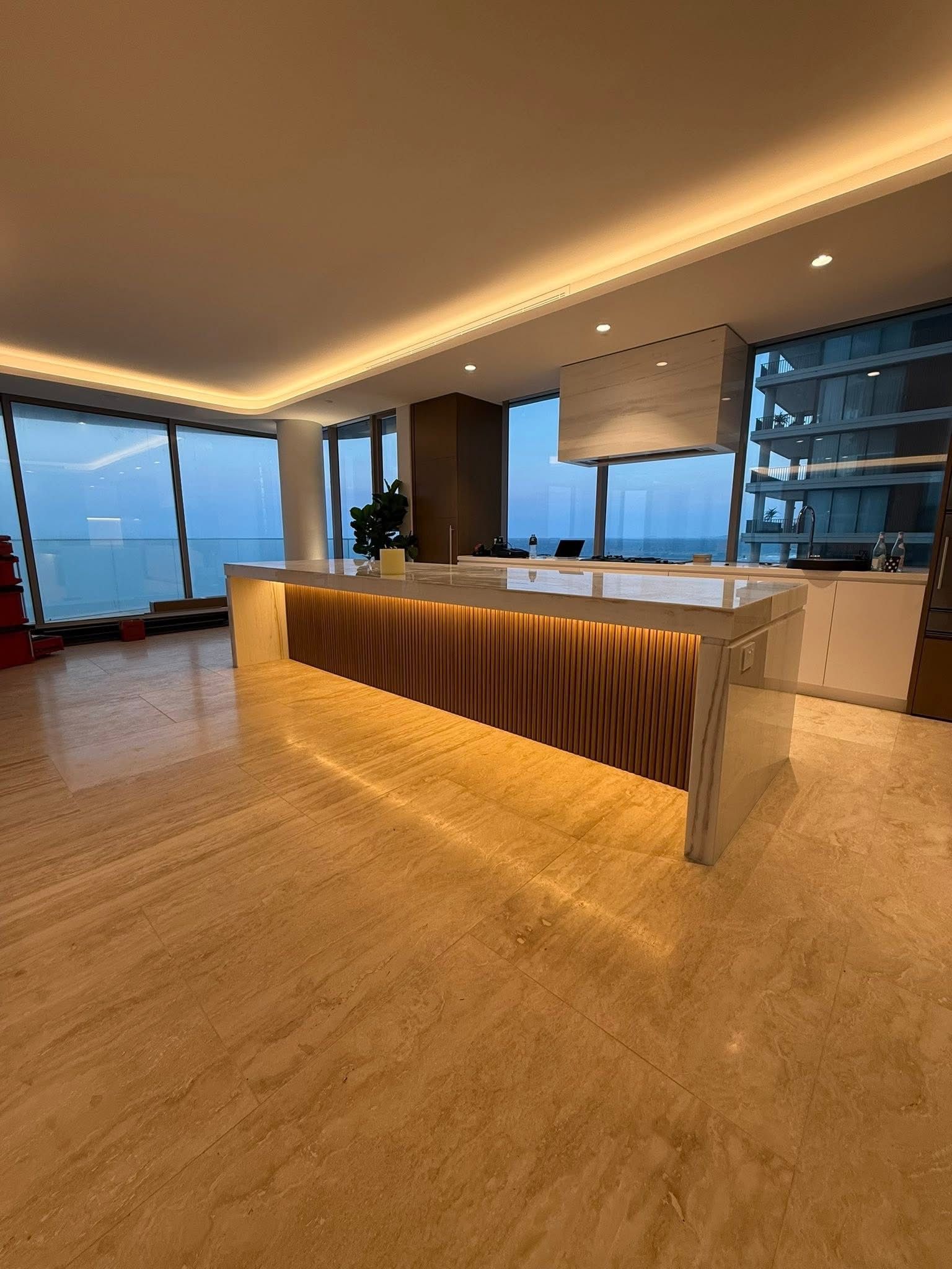 Modern Kitchen with Illuminated Island and Marble Floor — JPR Concepts in Burleigh Heads, QLD
