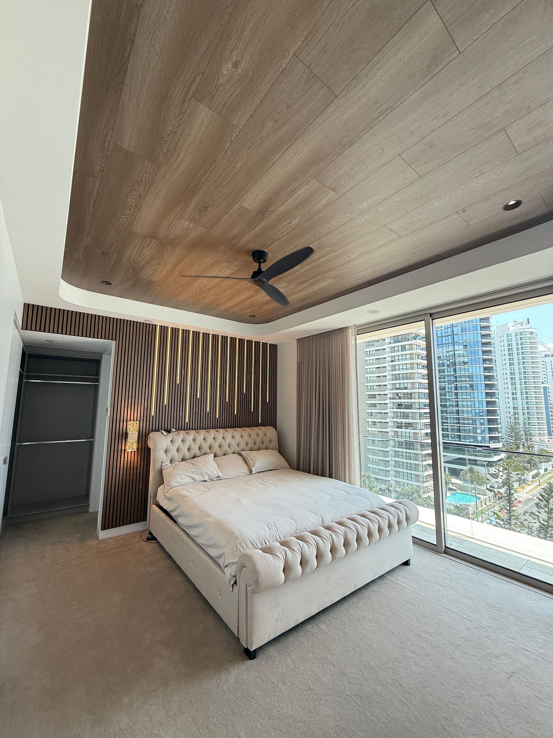 Modern Bedroom with Bed and Textured Wood Ceiling — JPR Concepts in Burleigh Heads, QLD