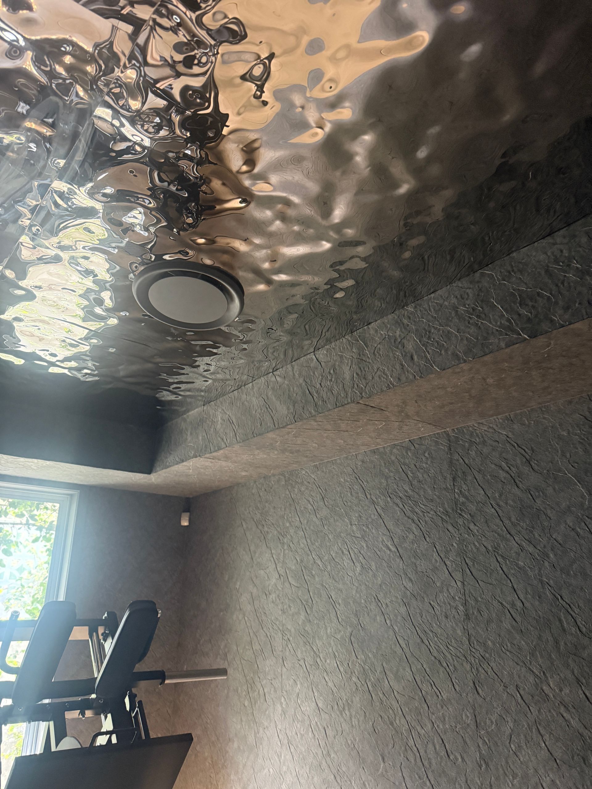 Indoor Room with A Reflective Ceiling and A Ceiling Light— JPR Concepts in Burleigh Heads, QLD