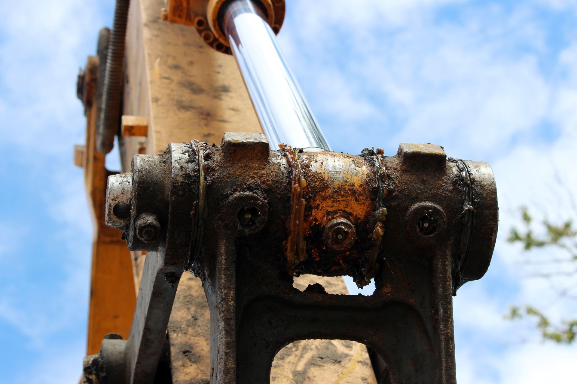 A close up of a hydraulic cylinder on a machine