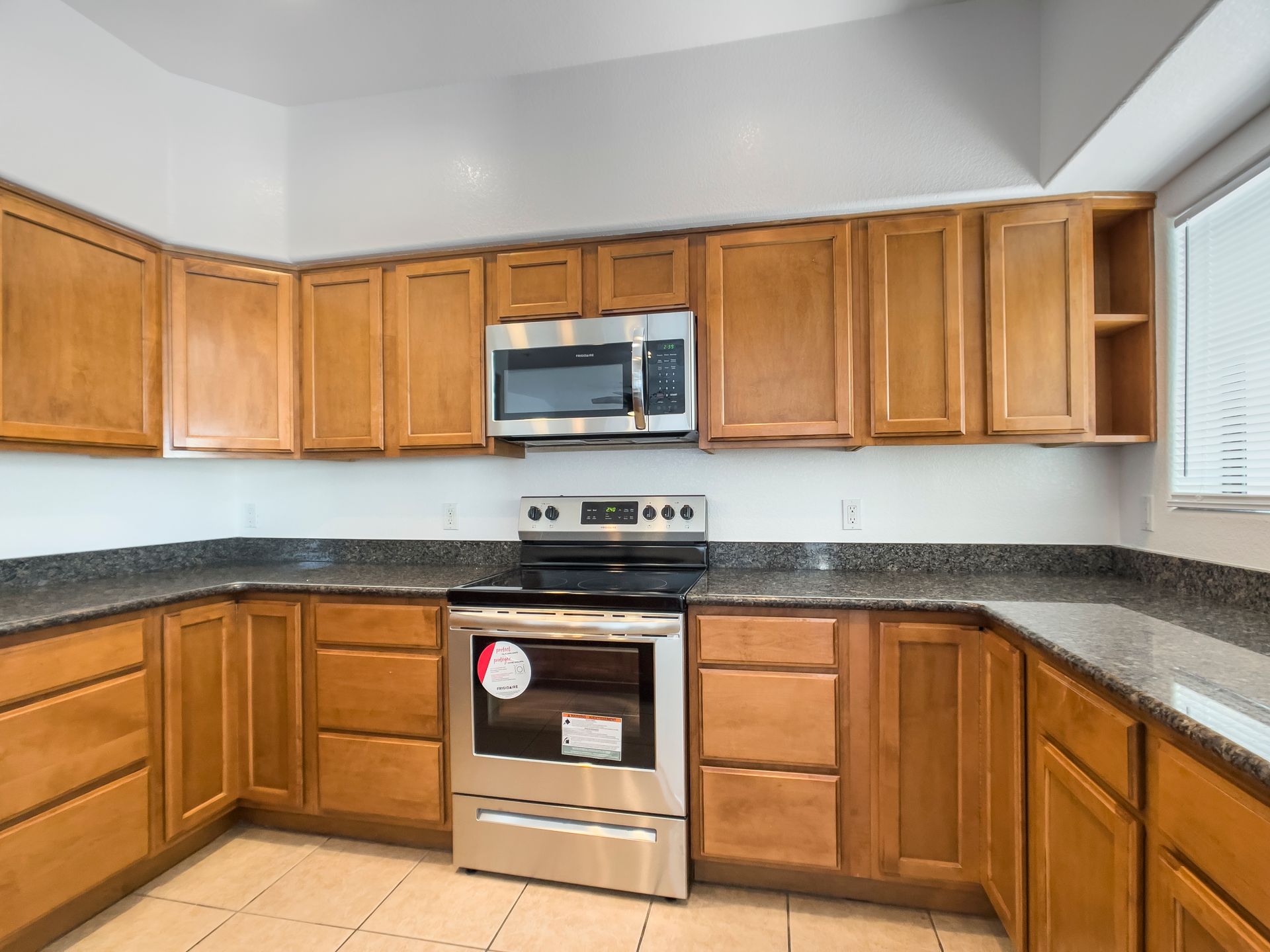 Apartment kitchen shown in the official Fringe on 61st gallery.
