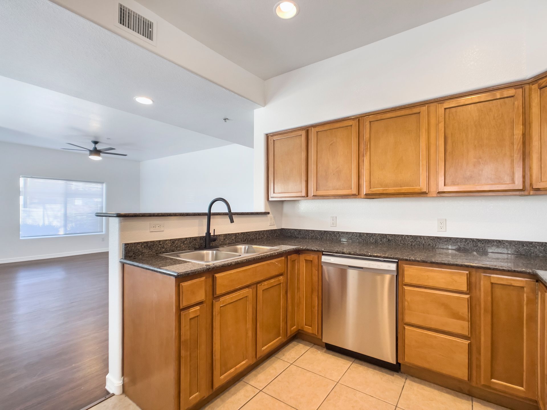 Apartment kitchen shown in the official Fringe on 61st gallery.