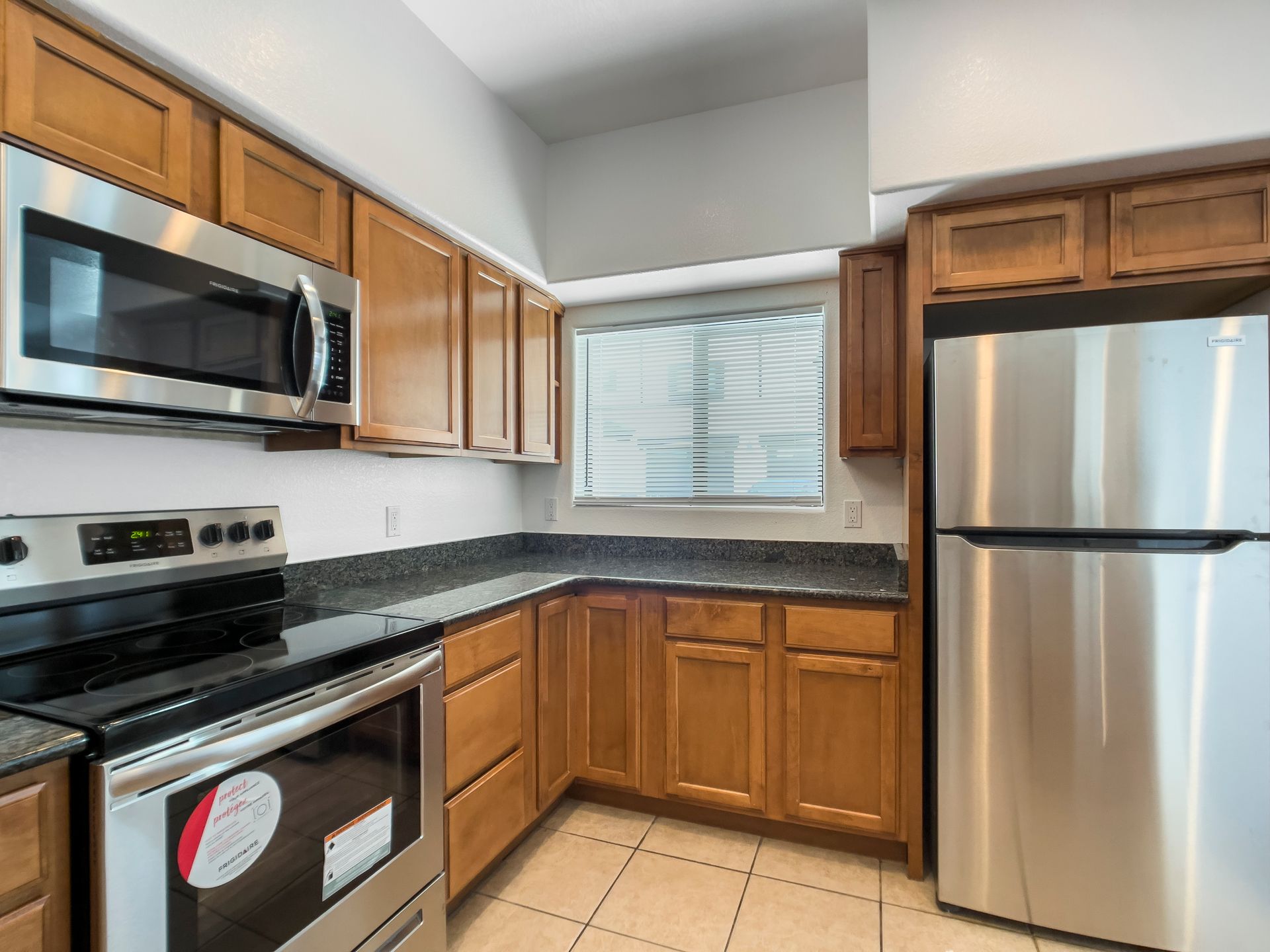Apartment kitchen shown in the official Fringe on 61st gallery.