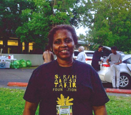 Woman in black t-shirt with