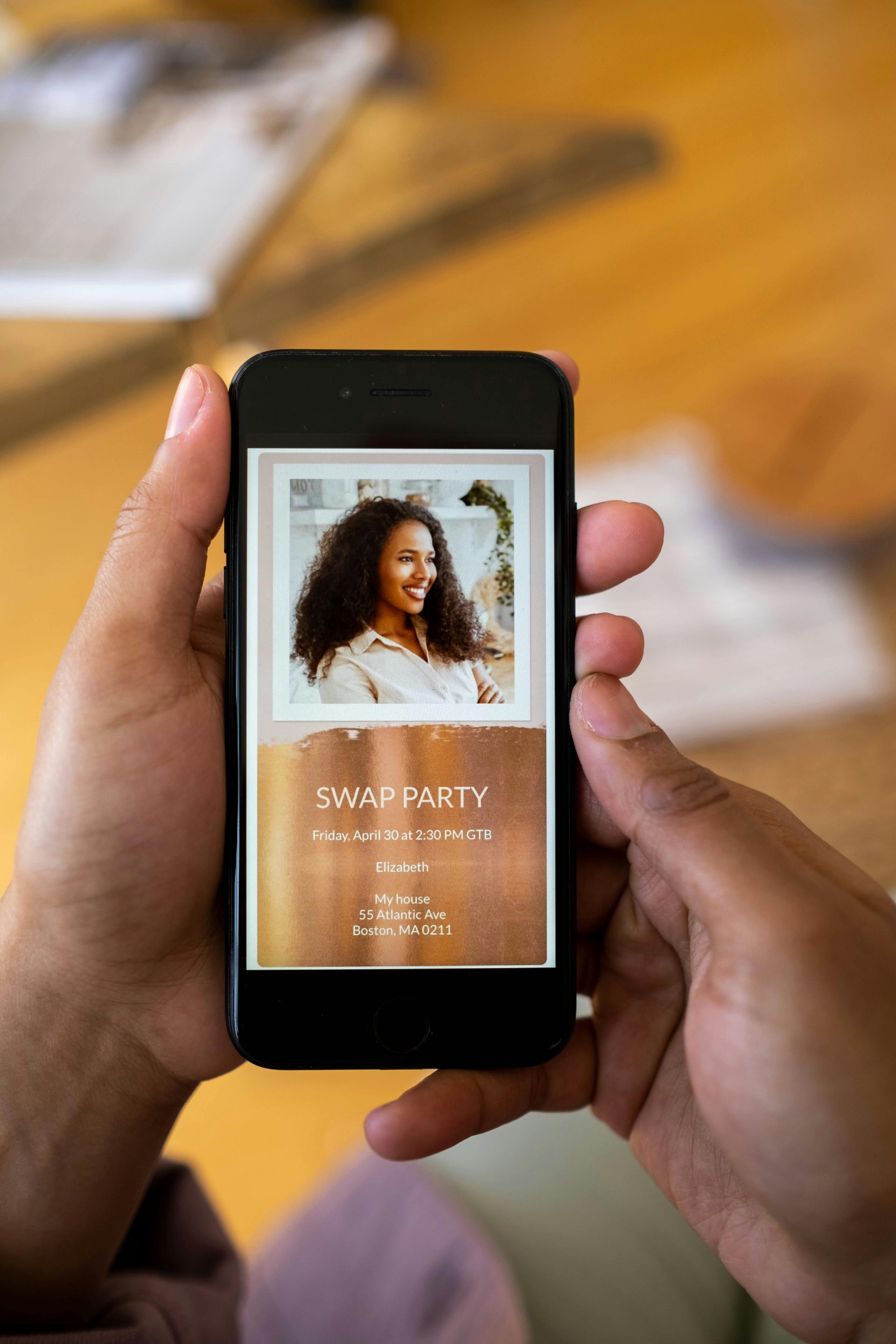 Person holding smartphone displaying