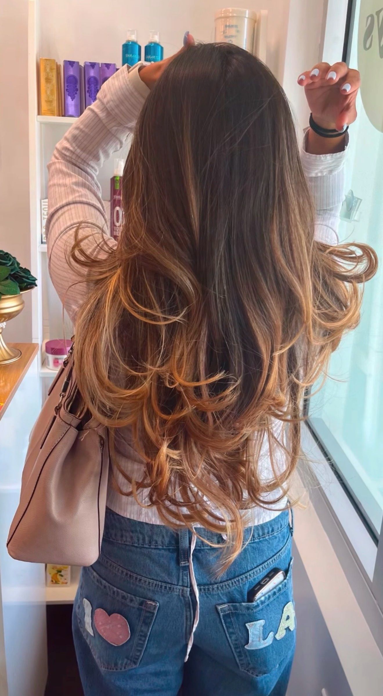 Blowout with large soft curls, back view