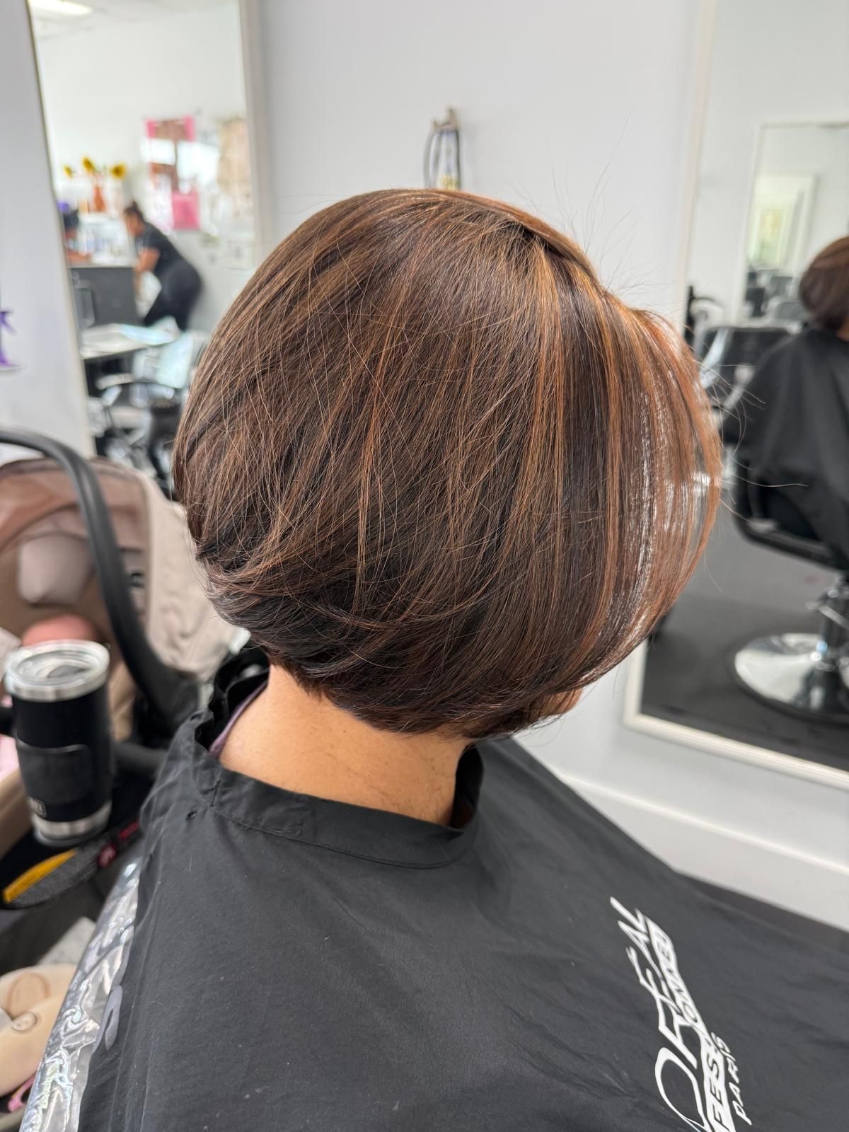 Bob haircut with caramel highlights, back view