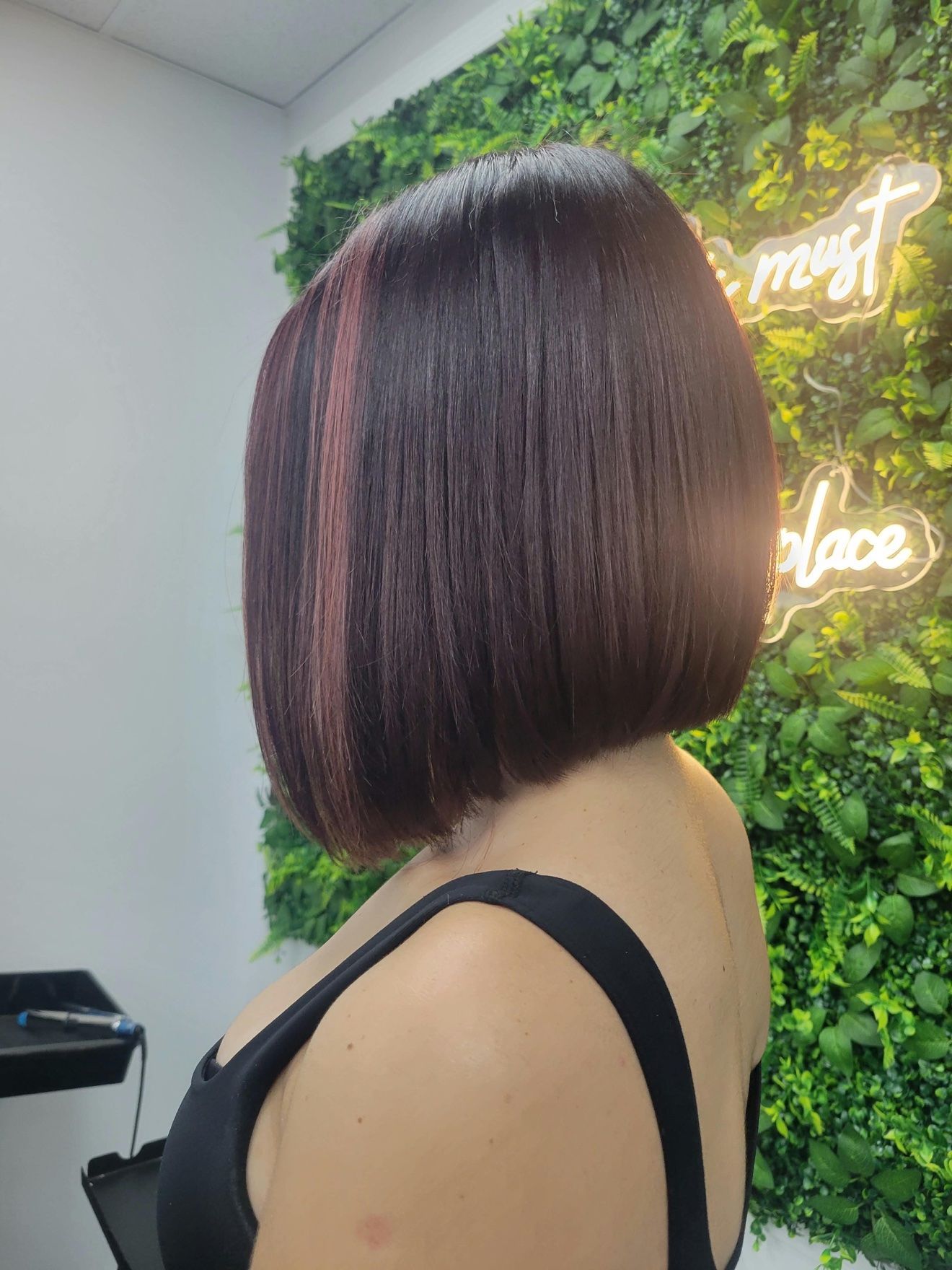 Blunt bob haircut in dark brown at Hairdoctors Miami