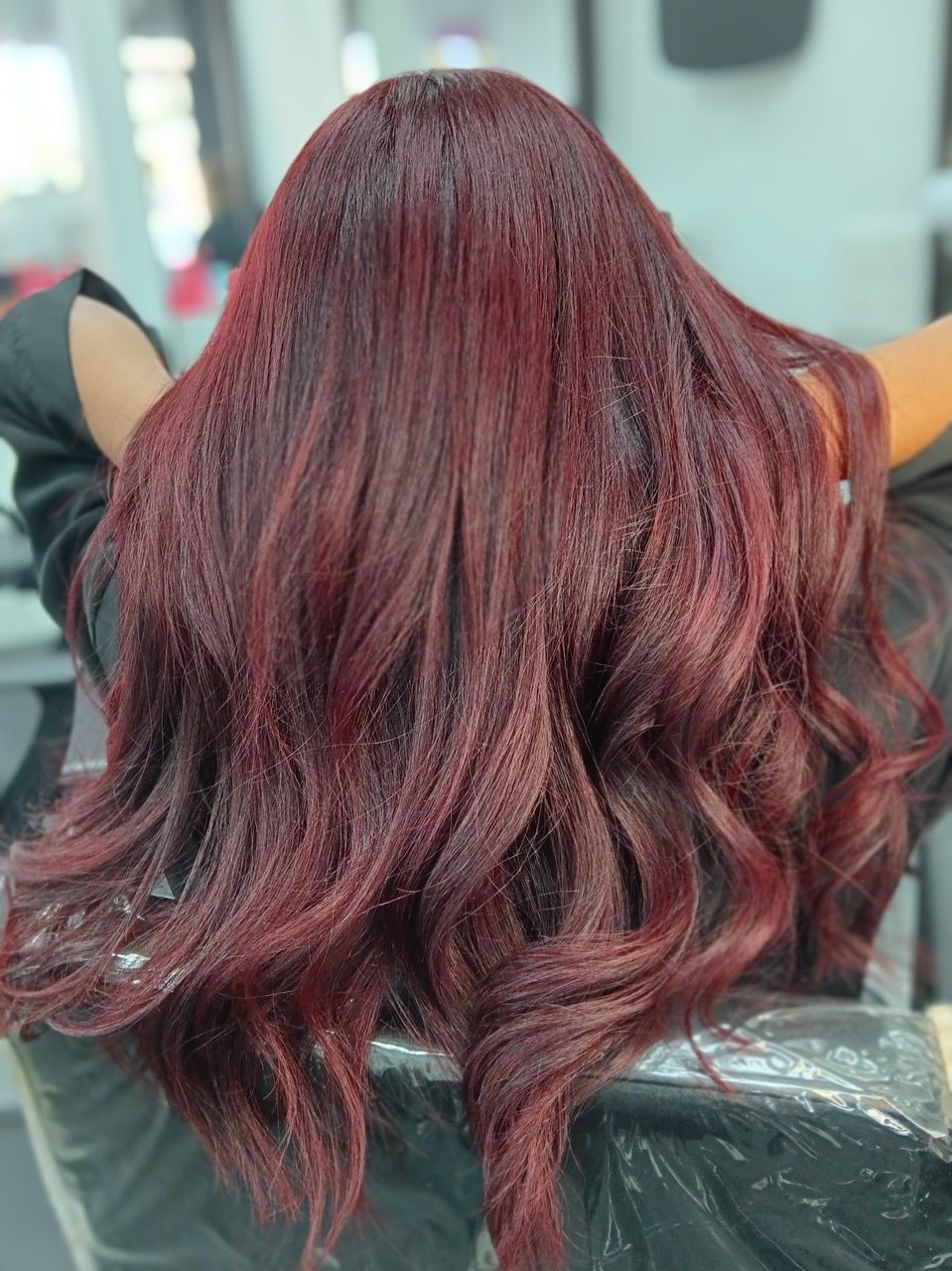 beautiful wavy red hair done at the hair salon