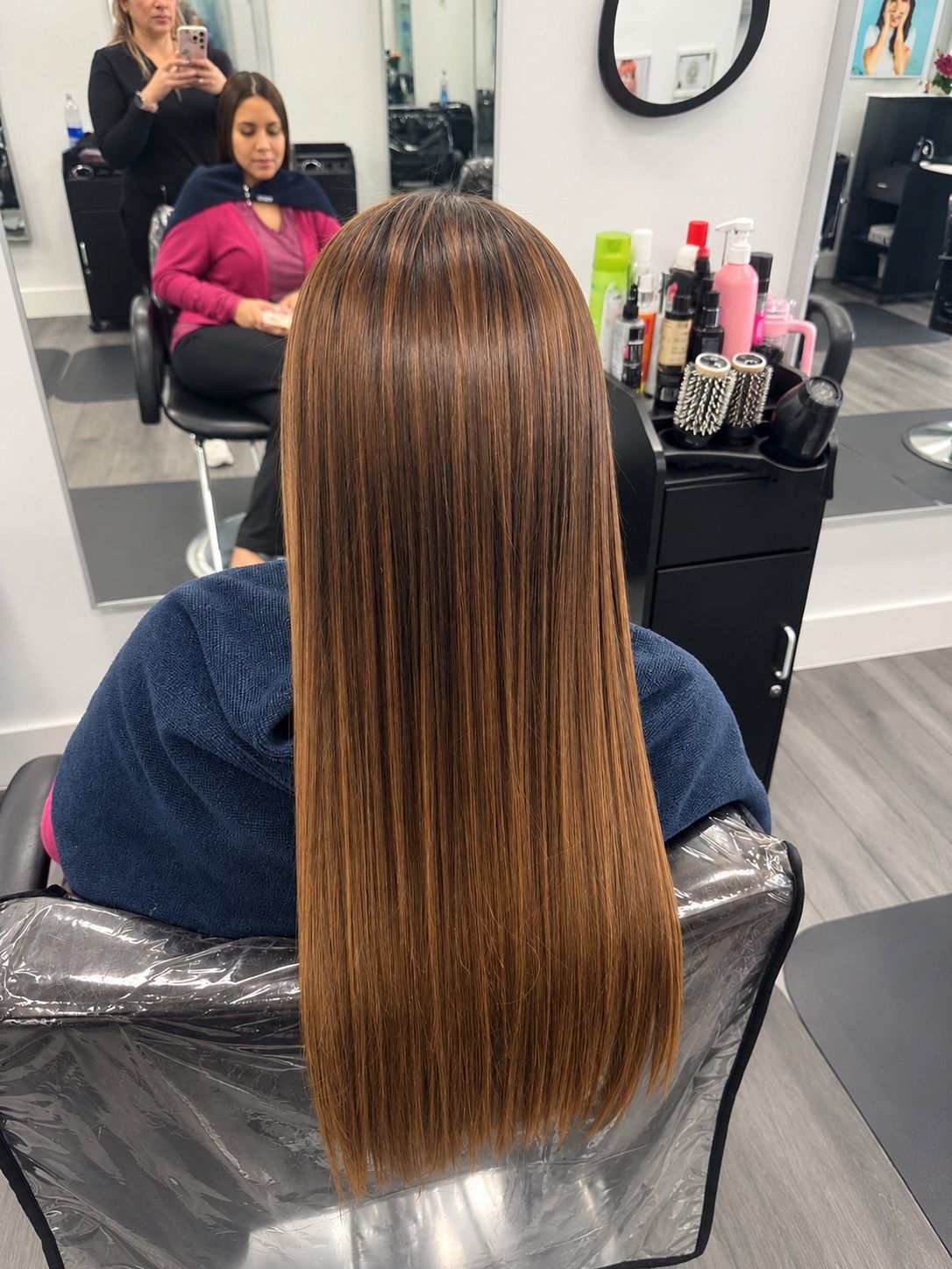 Straight, frizz-free caramel hair, back view