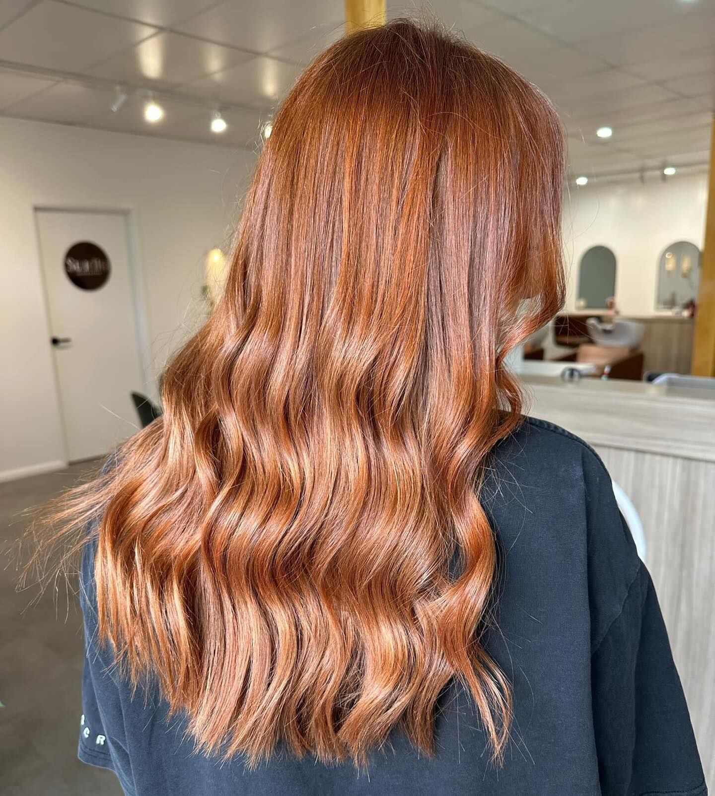 Long Wavy Reddish-brown Hair, Styled in a Salon — Salon South in Mount Sheridan, QLD