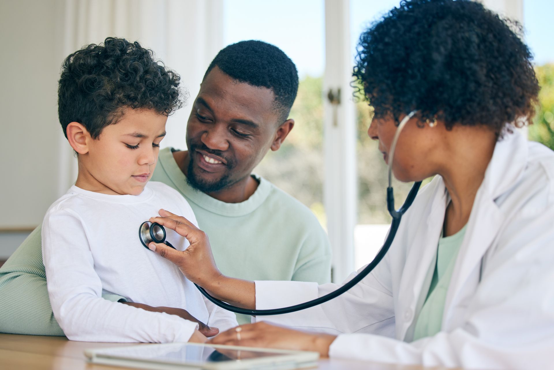 Doctor Examining a Child with A Stethoscope — Rainbow Beach General Practice in Rainbow Beach, QLD
