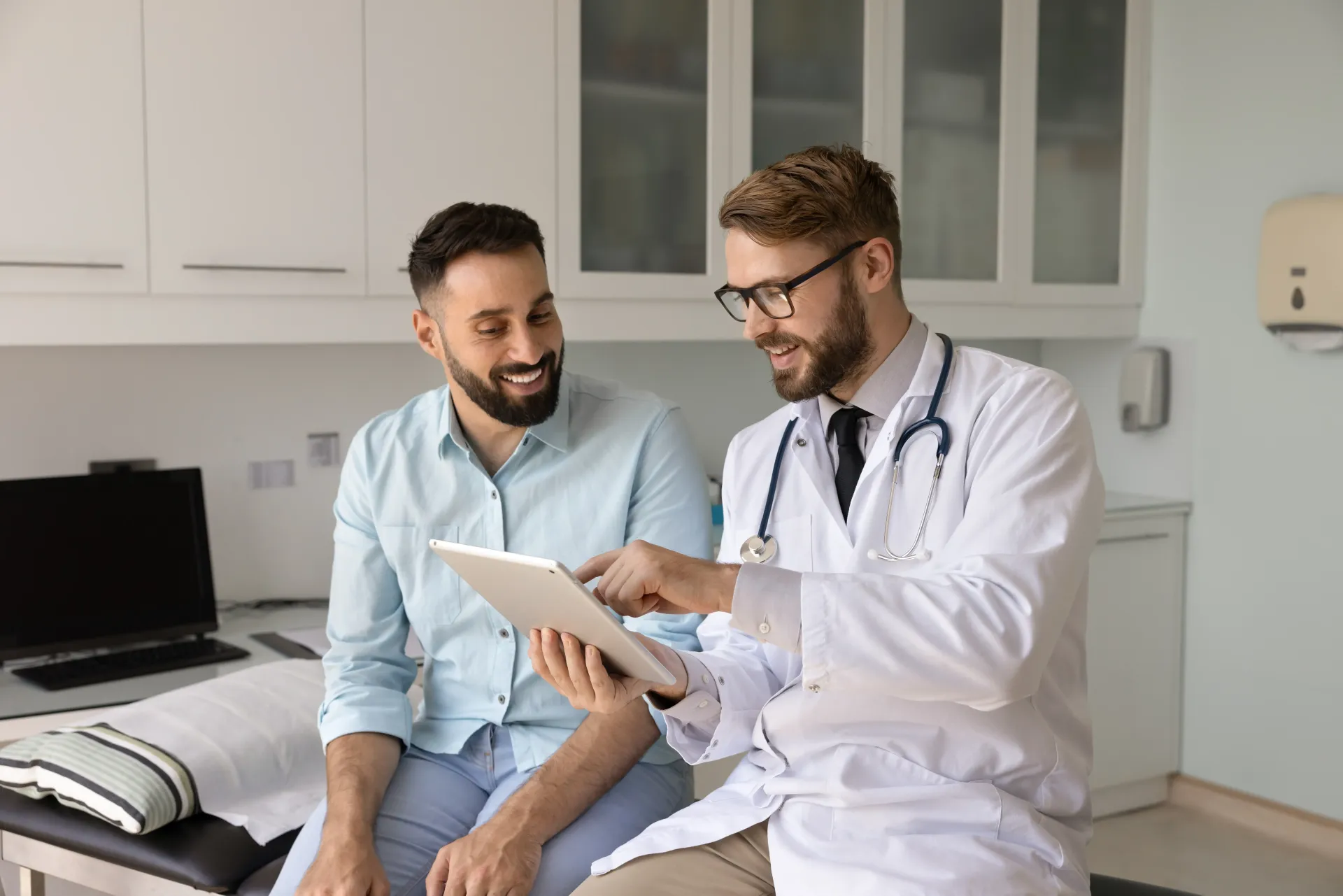 Doctor Showing Kidney Model to Patient During Consultation — Rainbow Beach General Practice in Rainbow Beach, QLD