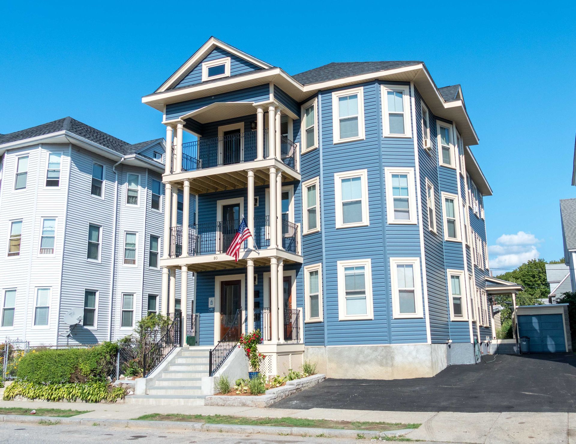 A large blue building with a lot of windows