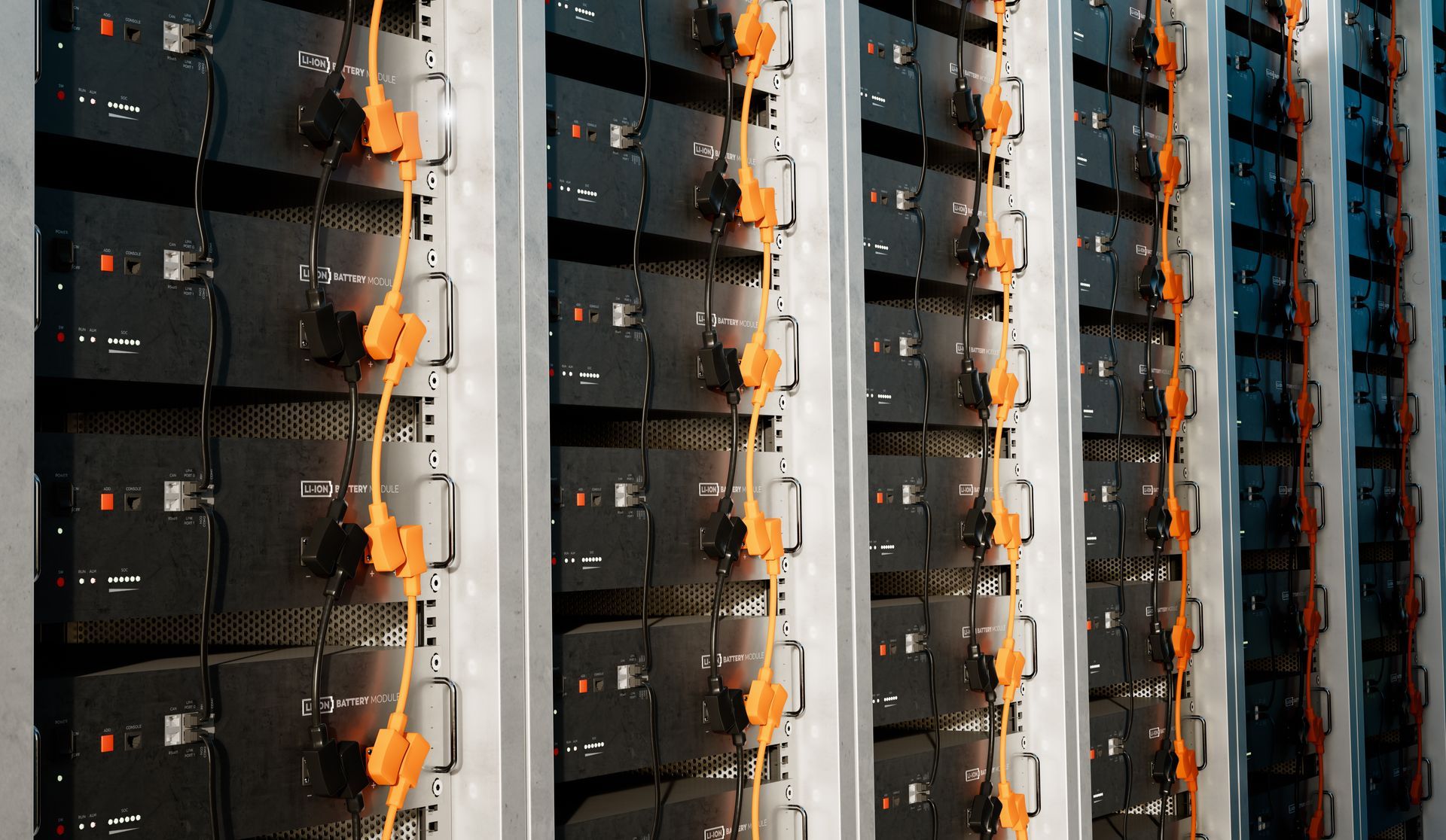 Rows of server racks with orange cabling in a data center corridor