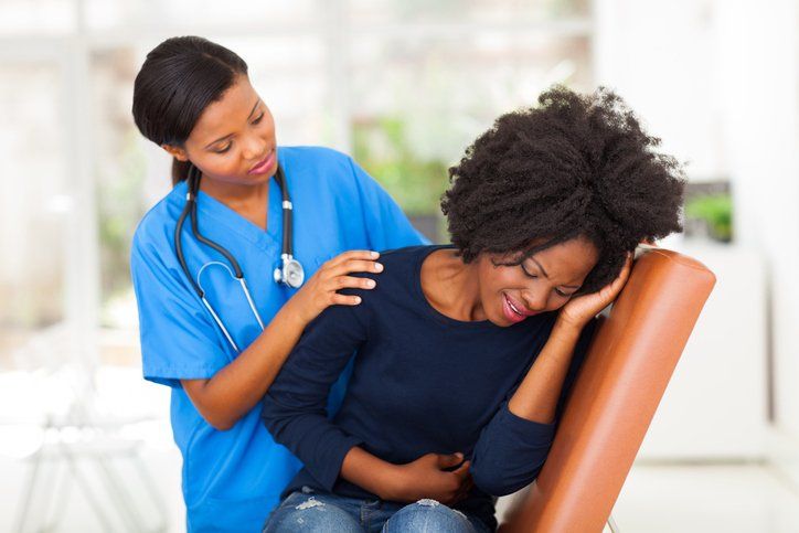 Doctor Checking on Patient with UTI — Nashville, TN — Nashville Healthcare Center