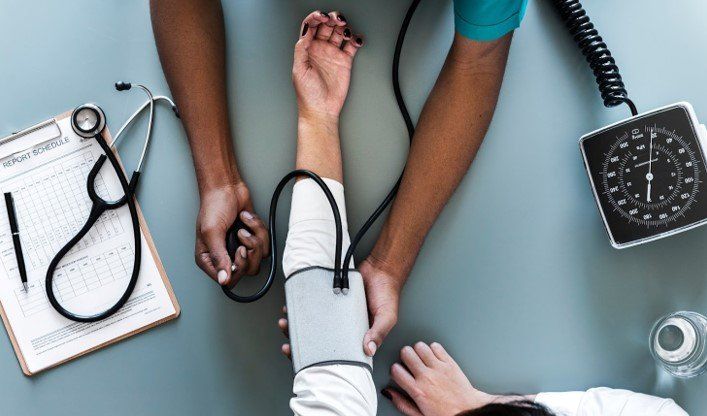 Checking blood pressure — Nashville, TN — Nashville Healthcare Center Checking blood pressure — Nashville, TN — Nashville Healthcare Center