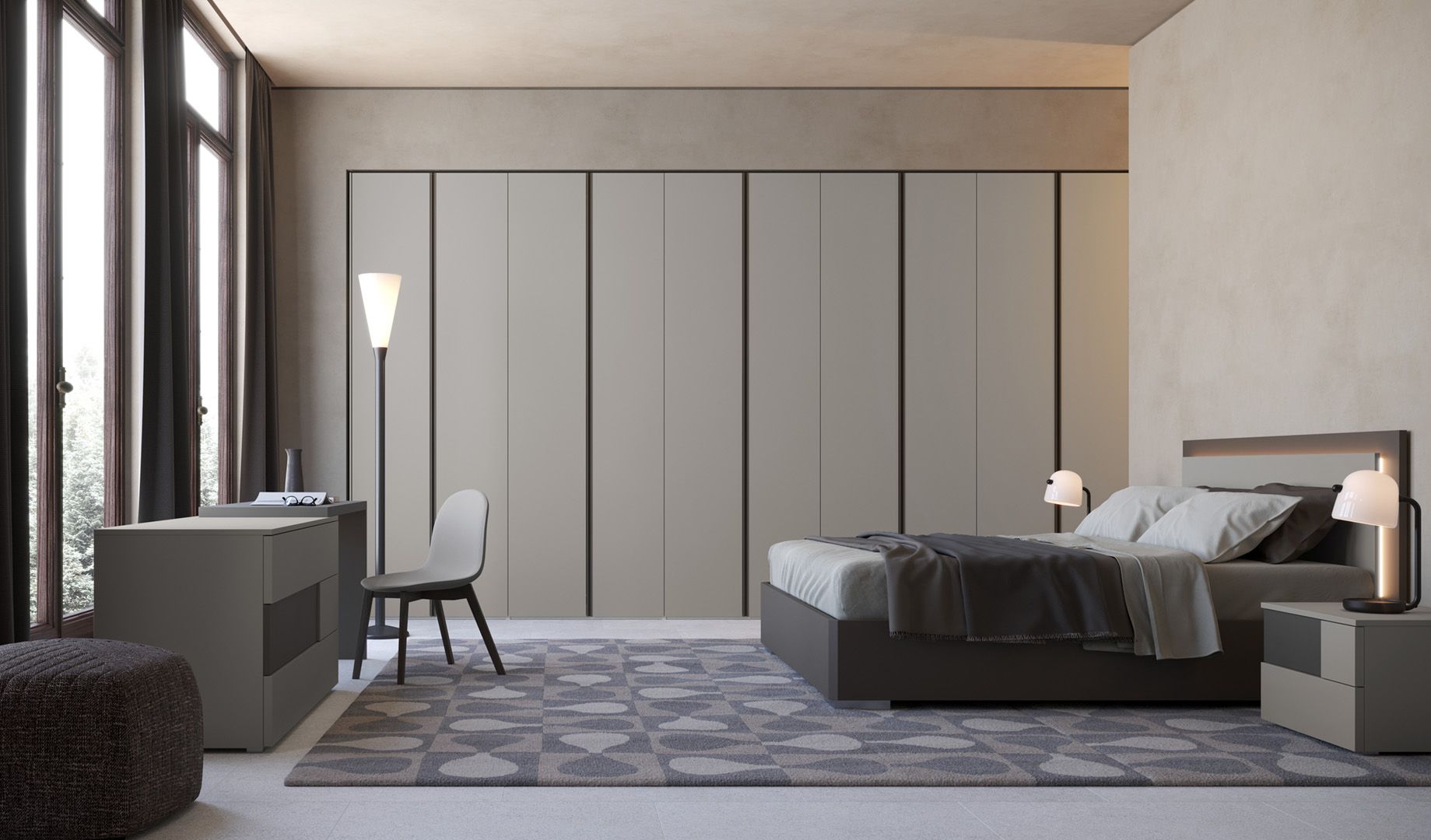 Camera da letto moderna con armadio a muro, letto, scrivania, tappeto e lampada da terra.