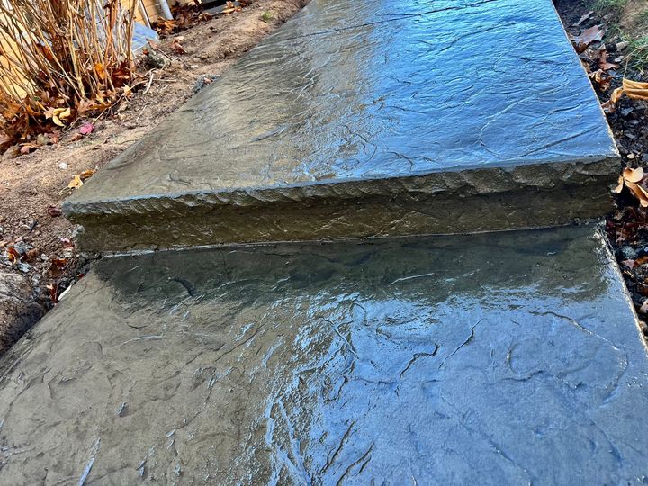 Cantilevered cut stone step