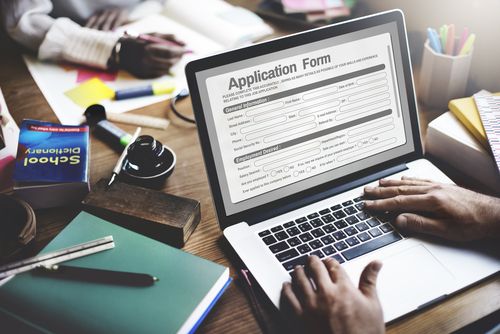 application form entry on laptop