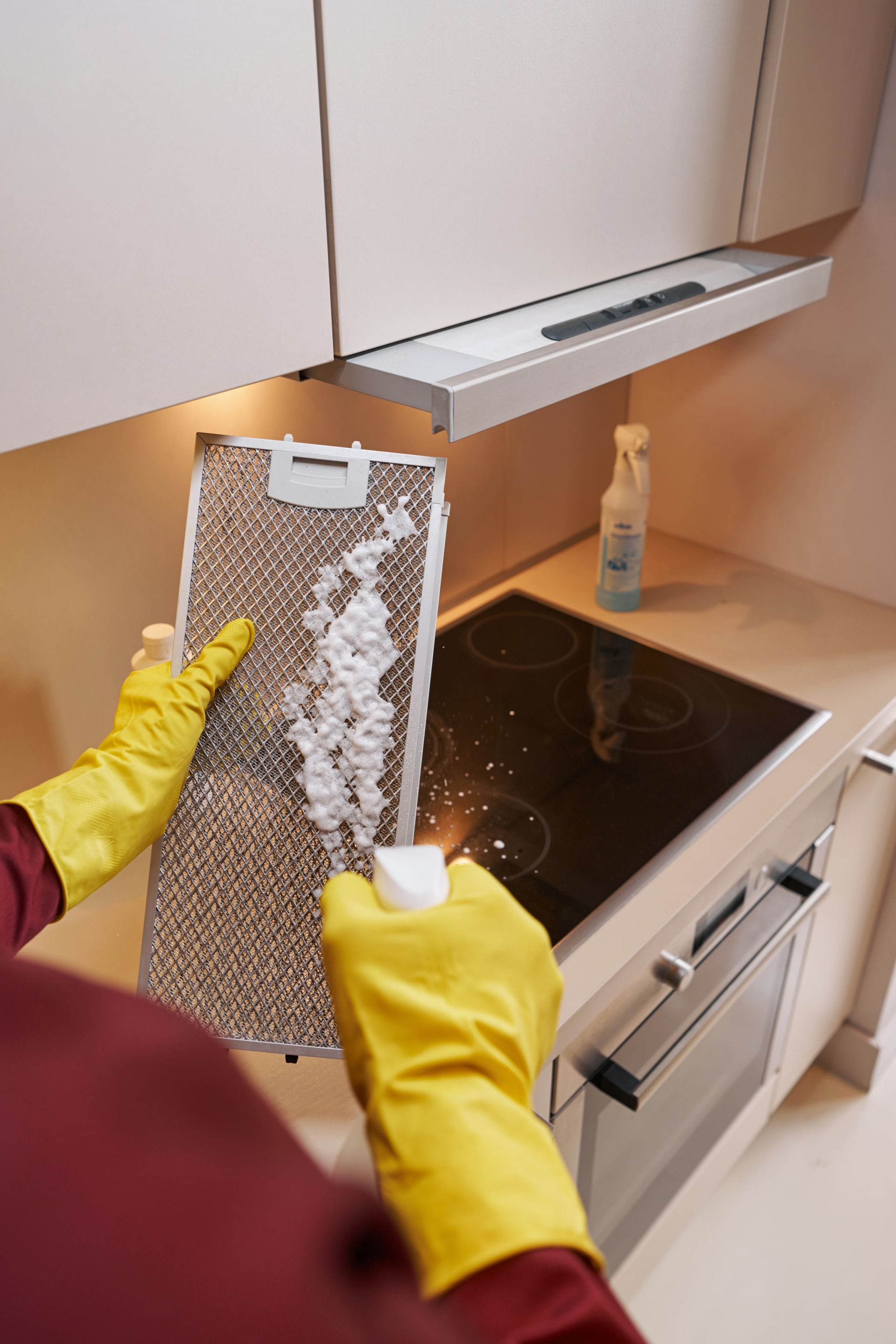 man cleaning filter