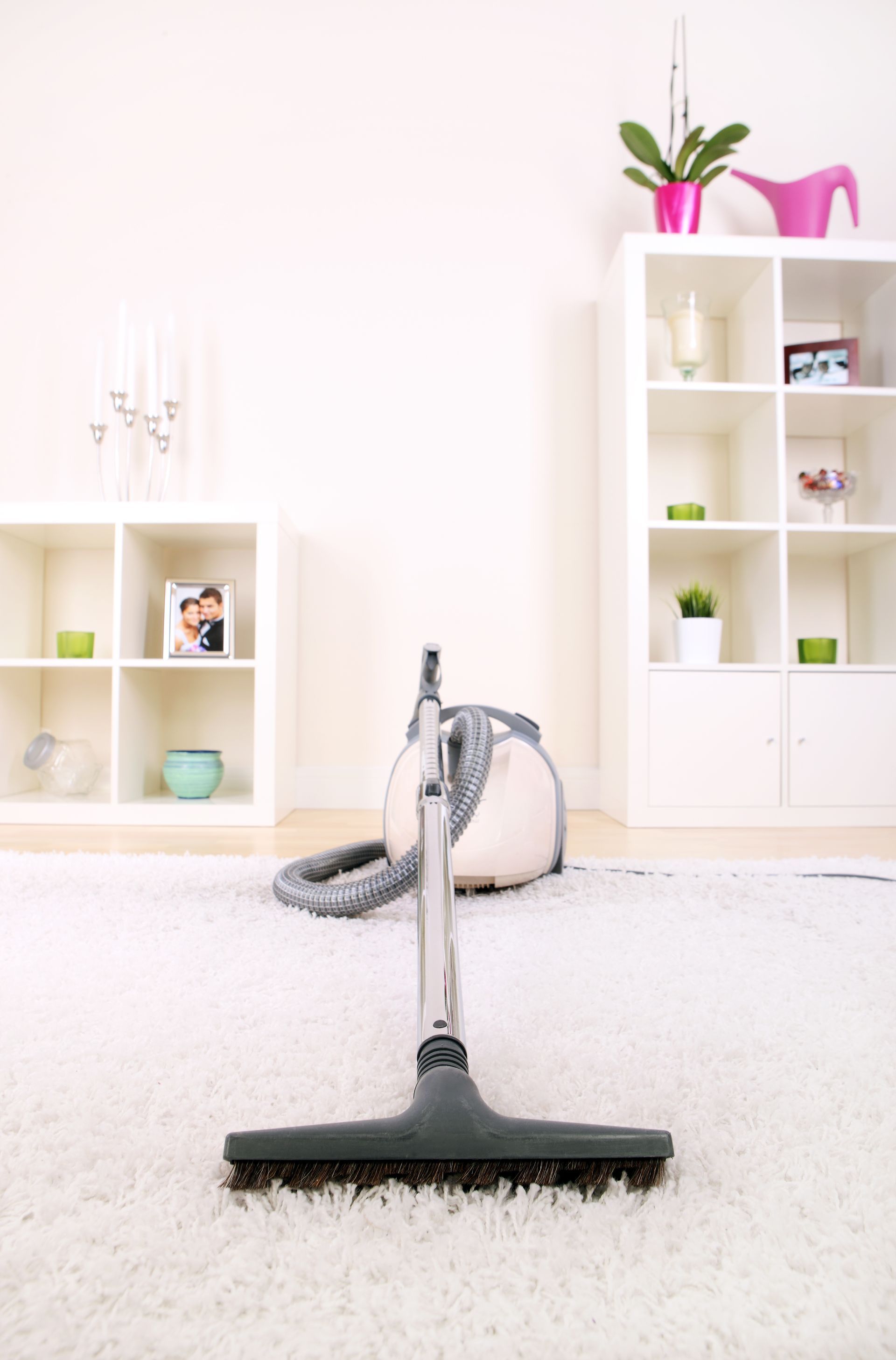 vacuum on carpet floor