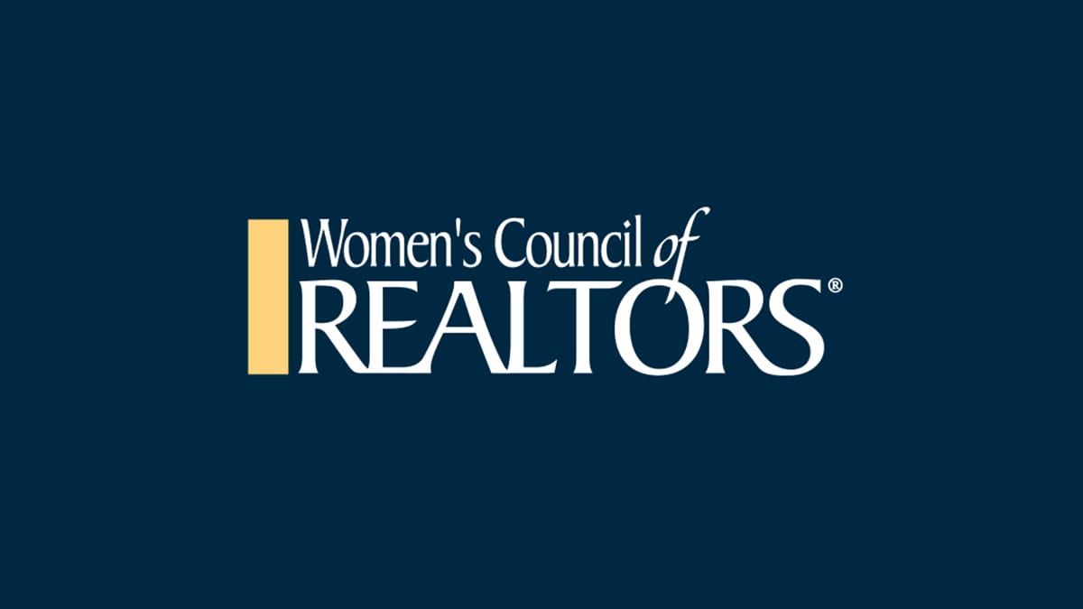 Women's Council of REALTORS logo on a dark blue background with gold and white text
