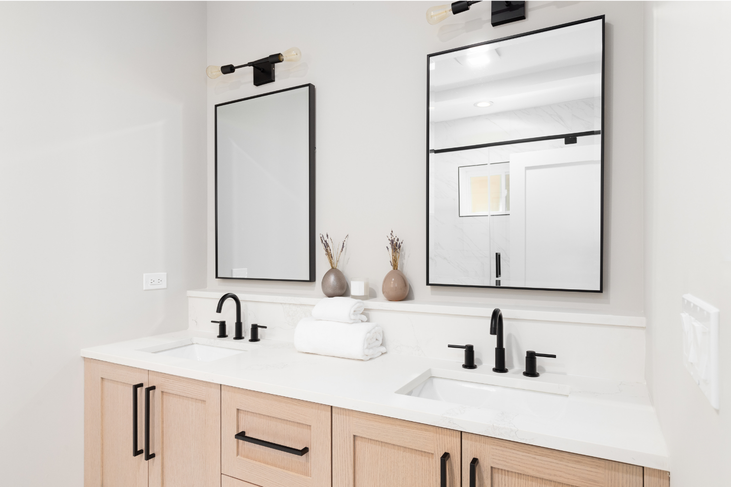 small bathroom remodel pale wood with double sinks.