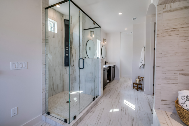 tub to shower conversion bathroom with white shower and detachable black shower head