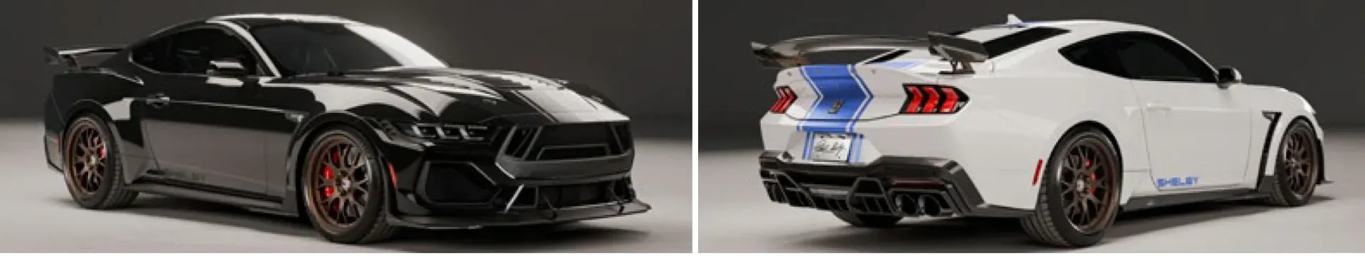 Two sports cars, a black one and a white one, shown side by side on a studio background.