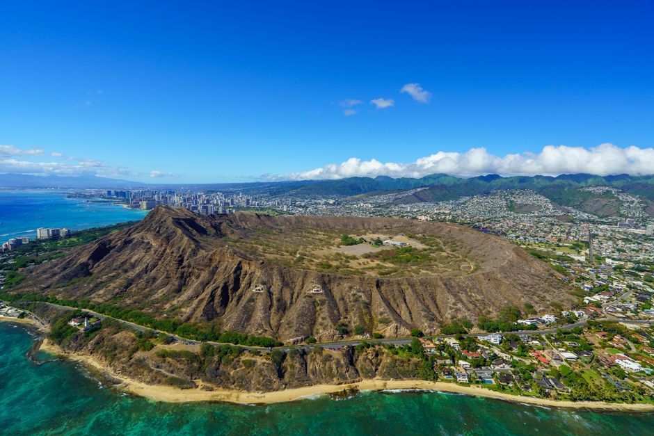 Aerial view of Diamond Head crater with Waikiki and the ocean behind