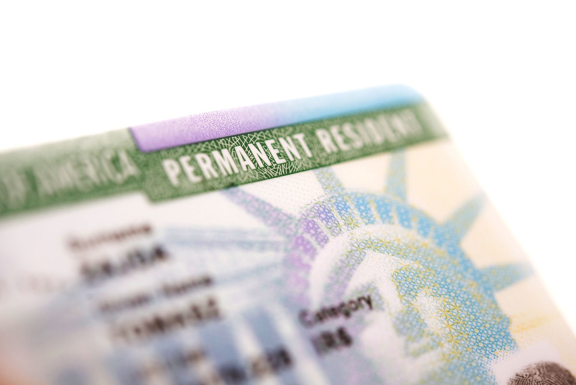 A close up of a green card for a permanent resident.