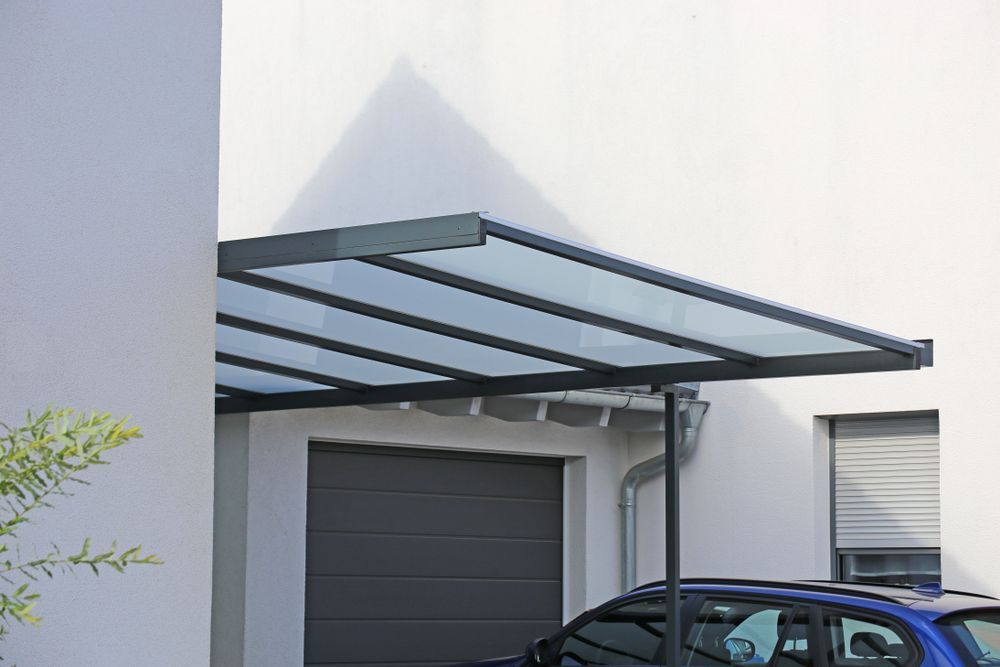 Carport Attached to a White House — Dachboe Your Handyman In Charters Towers, QLD