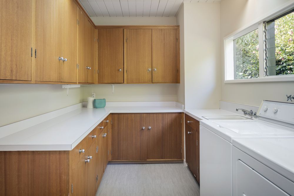 Laundry Room With Wooden Cabinets — Dachboe Your Handyman In Townsville, QLD