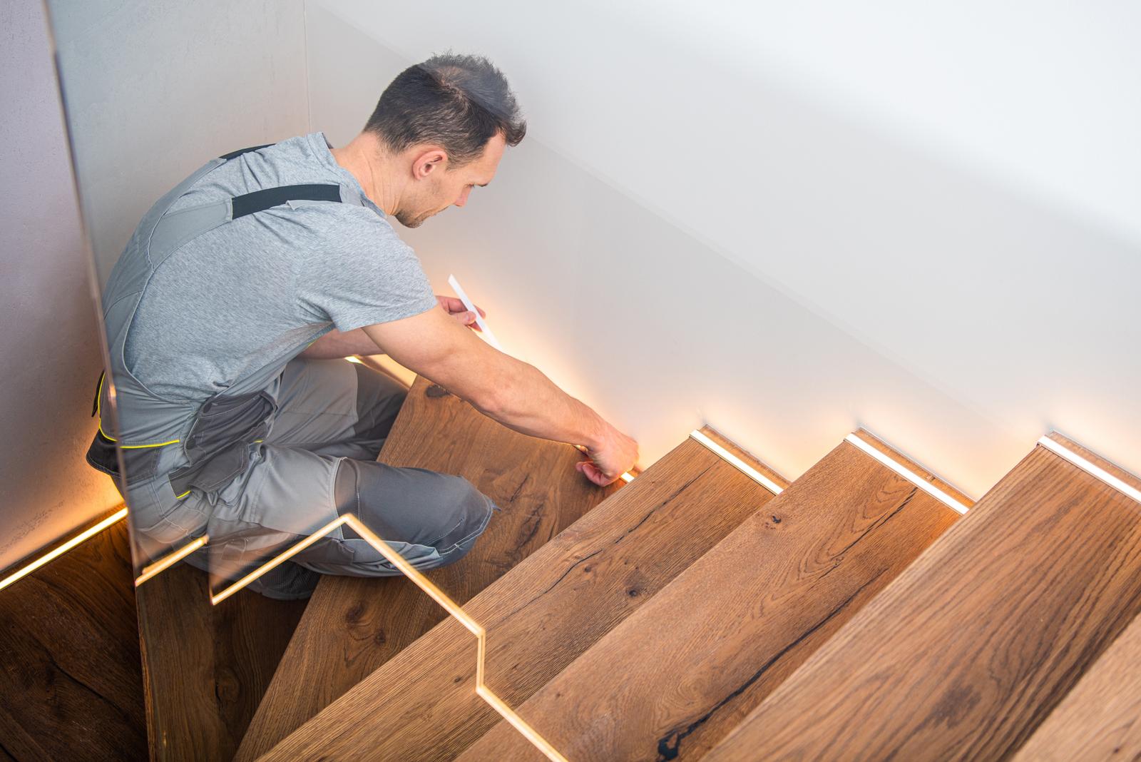 man working on basement stairs in Lancaster