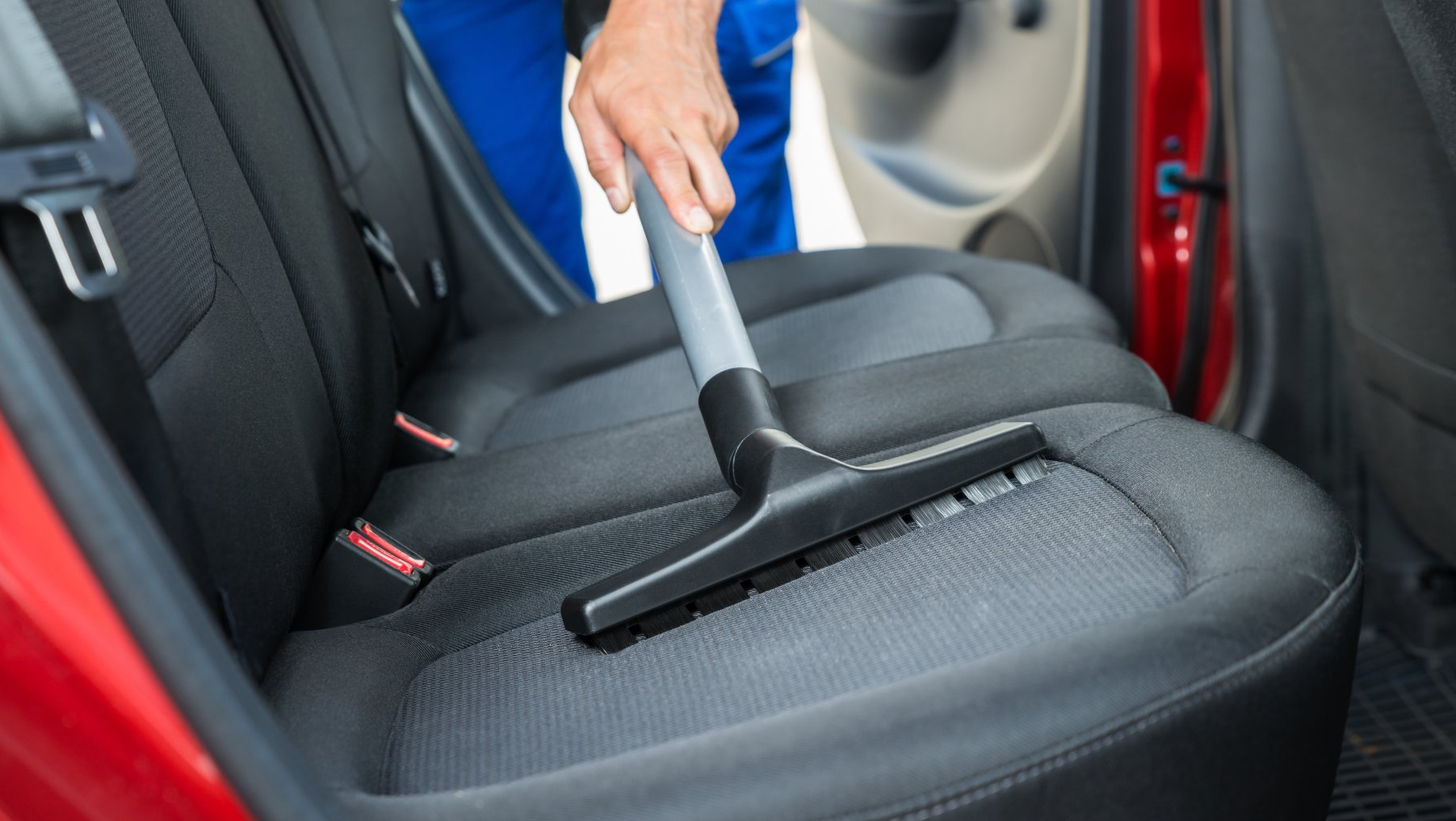vacuuming car back seat