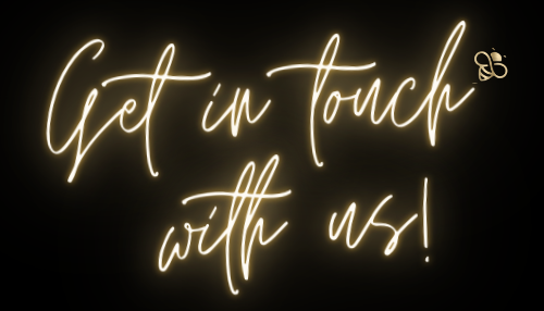 A neon sign that says `` get in touch with us '' on a black background.