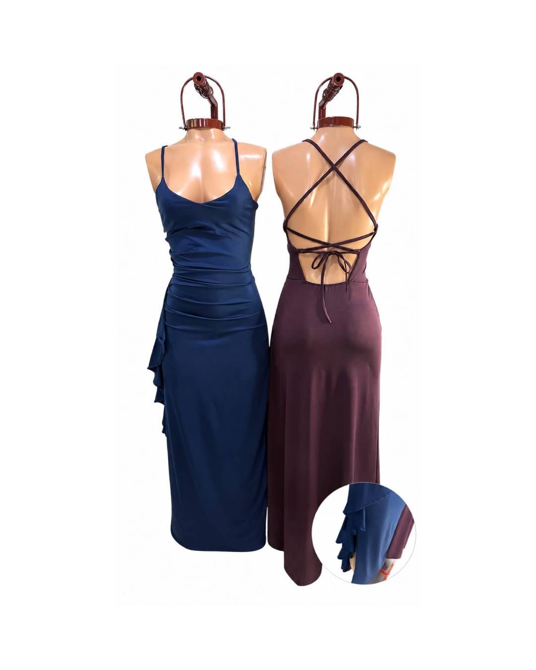 Dos vestidos de noche sin espalda en maniquíes: uno azul marino y otro burdeos, con tirantes cruzados.