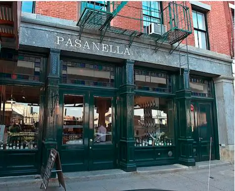 A restaurant called pasanella is located in a brick building