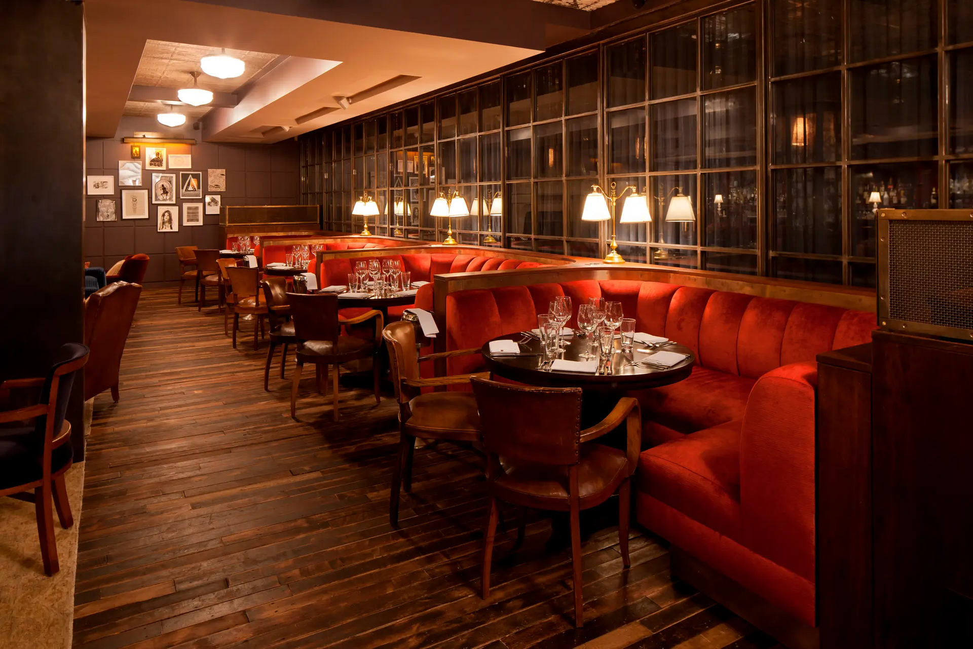 A restaurant with a lot of tables and chairs