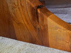 A close up of a piece of wood on a carpet