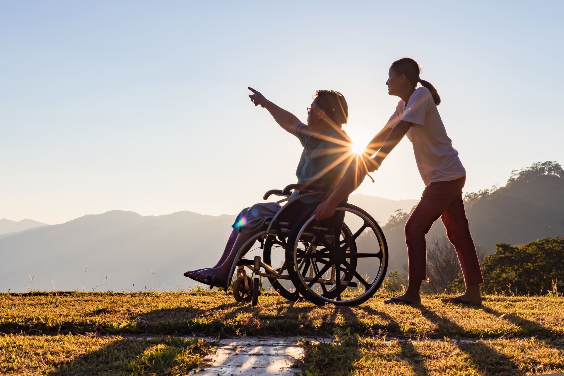 Two people enjoying an accessible outing outdoors
