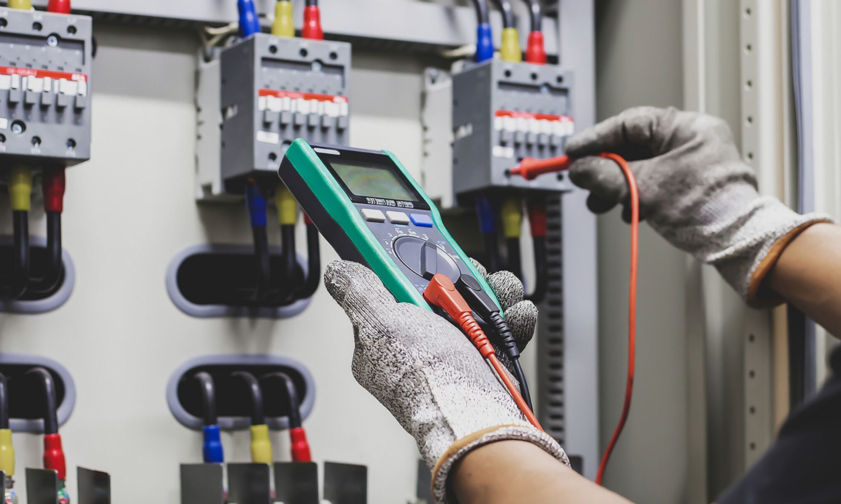 A Person Is Cleaning An Air Conditioner With A Spray Bottle — Davey Service & Maintenance Qld In Clinton, QLD