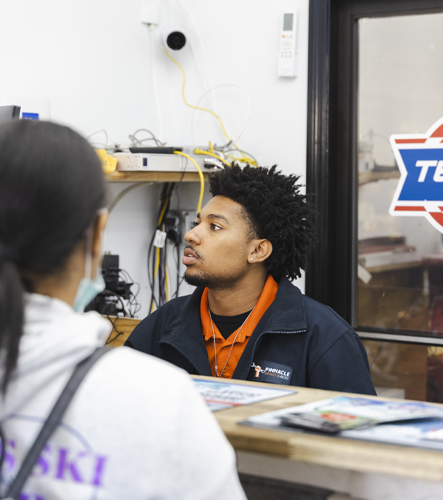 Our service advisor working at our front desk in Madison, TN | Pinnacle Automotive