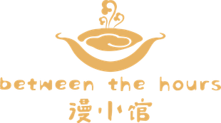 Golden logo of a steaming bowl over hands, with &ldquo;between the hours&rdquo; and Chinese characters beneath